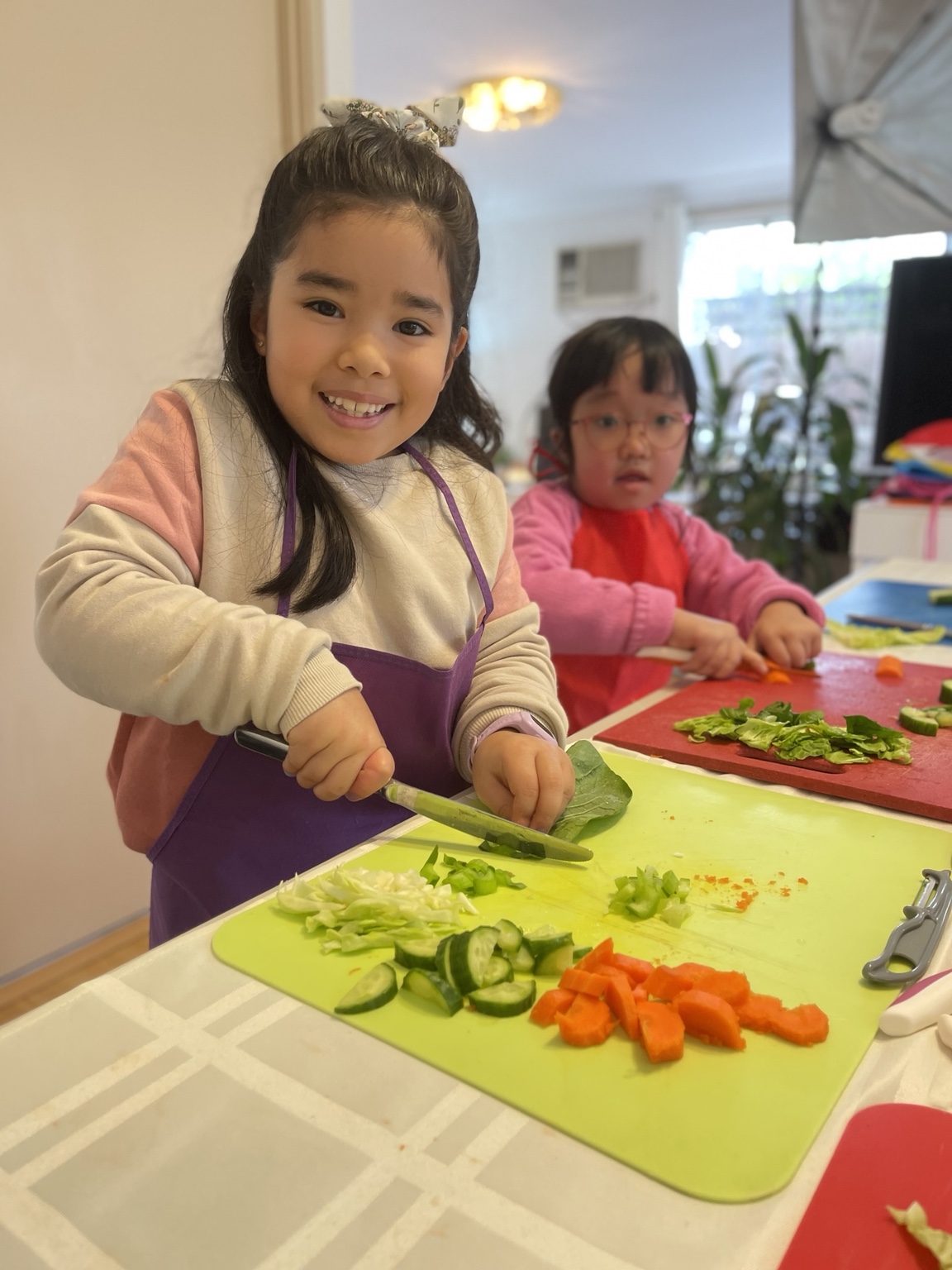 Children building confidence while preparing food